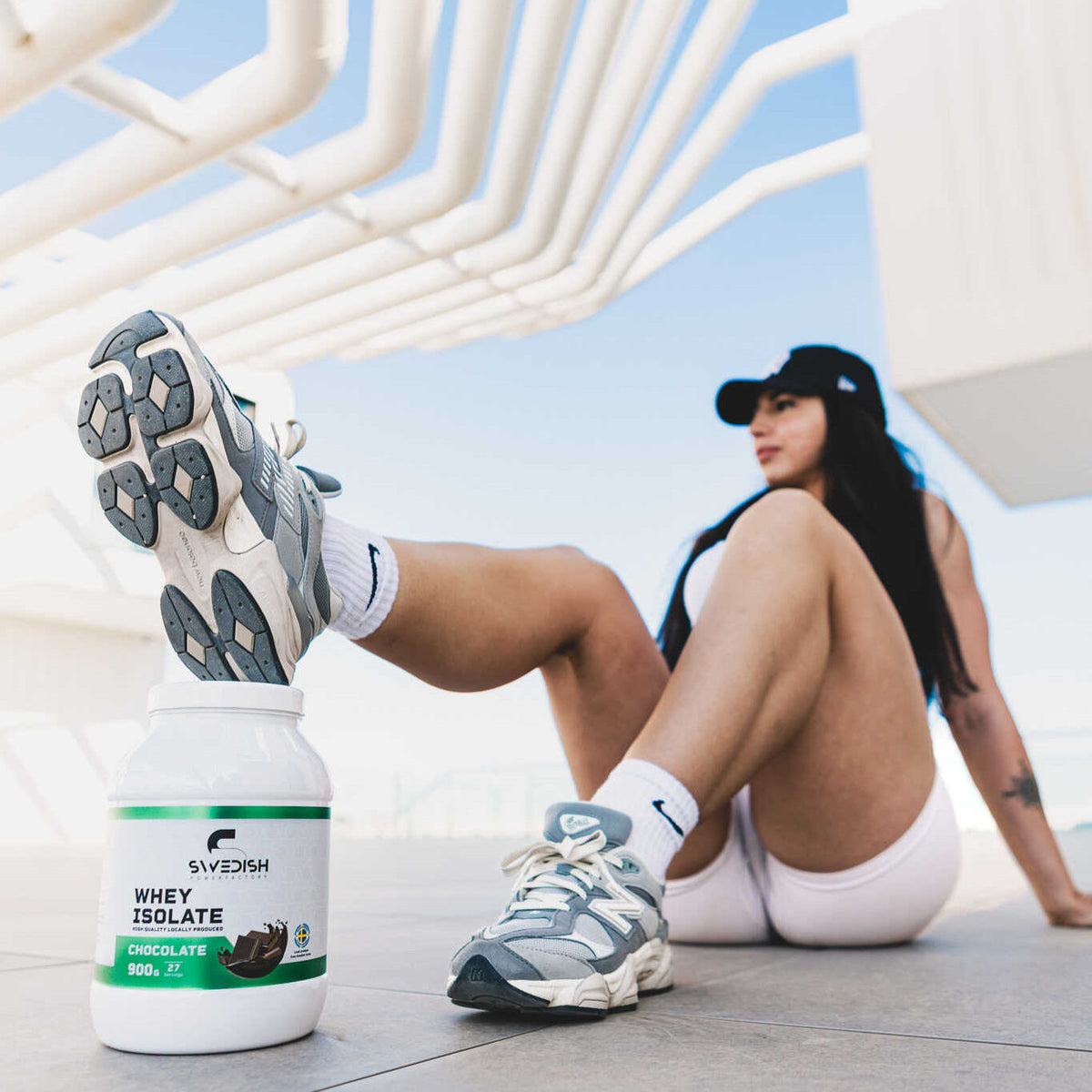 whey protein vassleisolat kvinna i solen